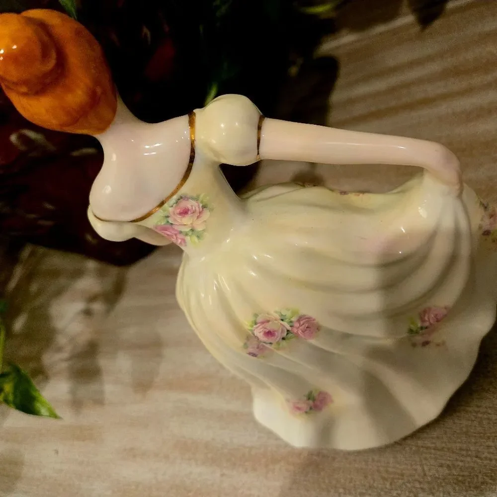 Elegant Porcelain Figurine with Floral Accents DANCING LADY 8 INCHES